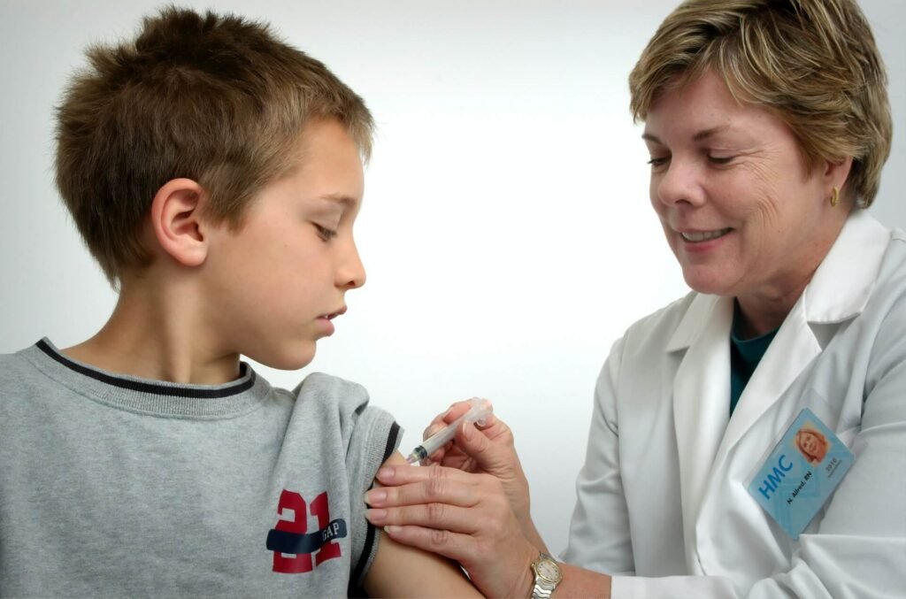 A children is getting a vaccine